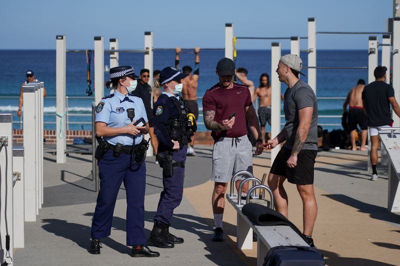 Sydney adds four weeks to lockdown as Australia COVID-19 cases spike