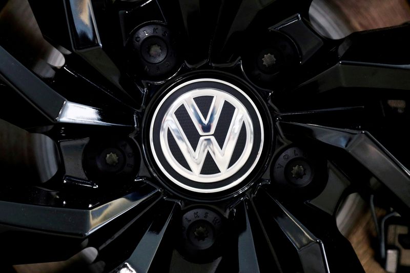 Tesla-chaser Volkswagen lifts margin outlook again after record profit