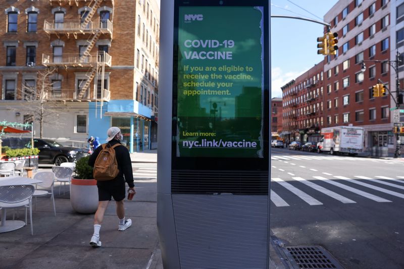 Biden pushes cash reward to get vaccinated, new rules for federal workers