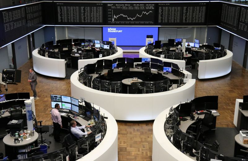 European stocks slip but set for best week since May