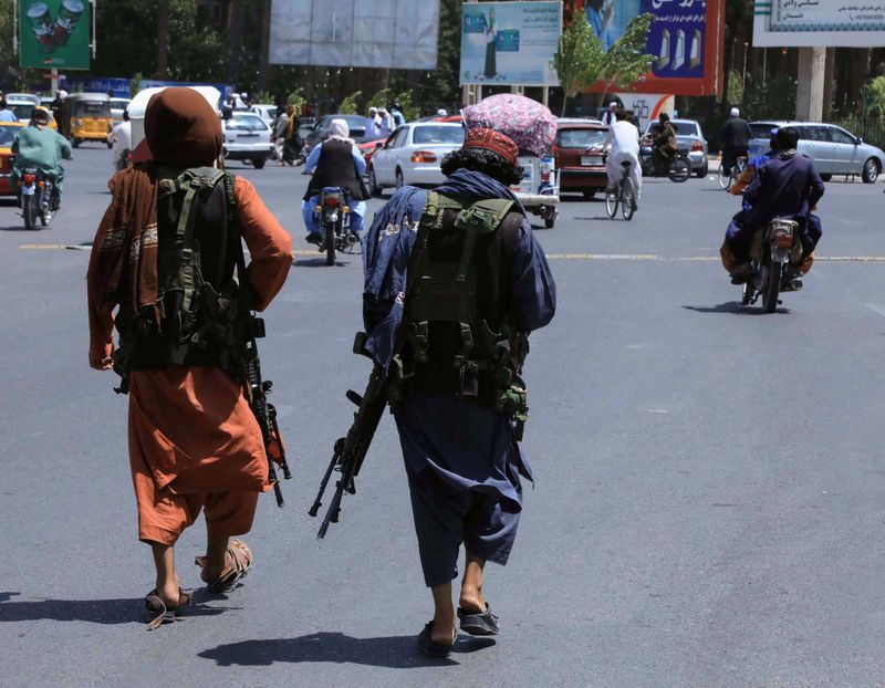 Chaos, desperation at Kabul airport as Biden defends withdrawal from Afghanistan