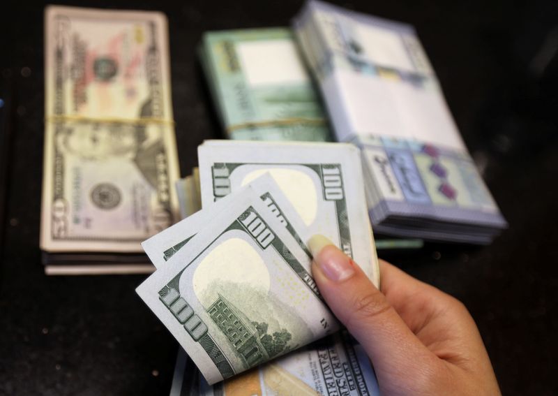 Dollar hits highest in over 9 months as risk aversion slams Aussie, Canada's loonie