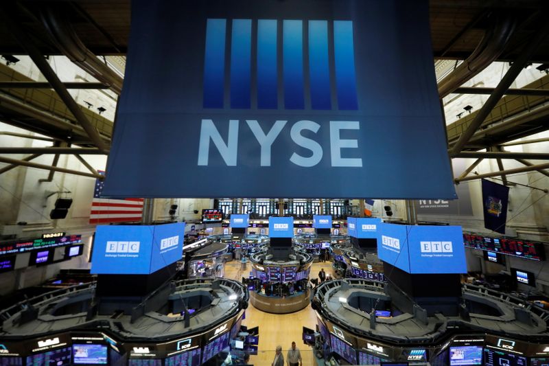Wall St gains, Nasdaq notches record closing high on full vaccine approval