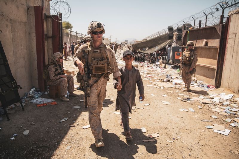 Biden says Afghan evacuation on track; humanitarian crisis looms