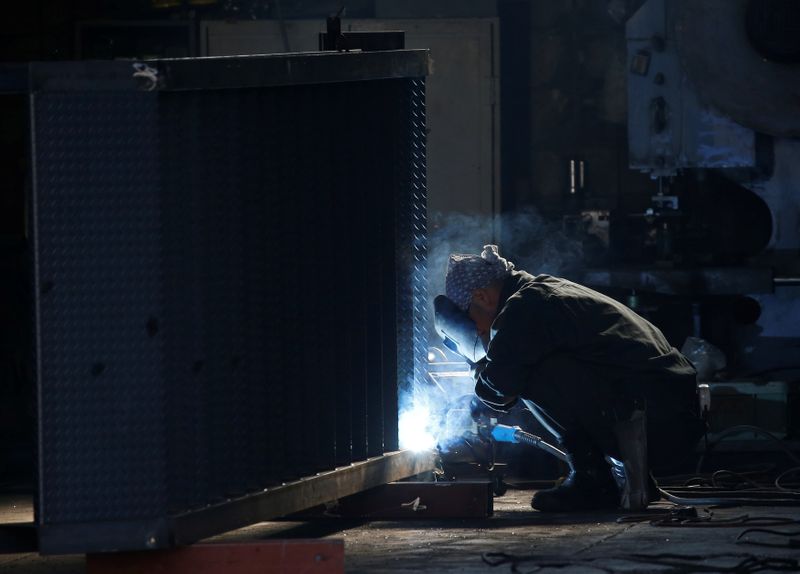 Japan's July factory output to fall as Delta variant spreads in Asia: Reuters poll