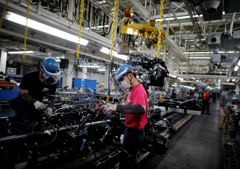 Japan's July factory output falls as COVID-19 disruptions hit