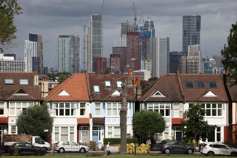 UK households rein in borrowing in July, repay mortgages