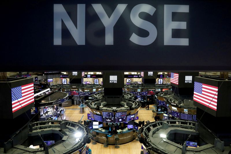 S&P 500 ends down, Big Tech lifts Nasdaq to record