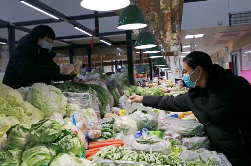 China's factory inflation hits 13-year high as materials costs soar