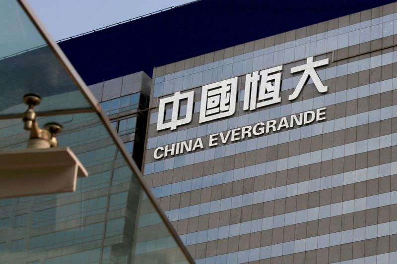 China Evergrande shares, bonds dive further on default worries