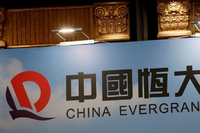 China Evergrande’s Main Unit Suspends Bond Trading, Shares Tumble