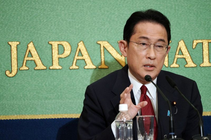 Japan's PM contender Kishida says won't raise sales tax for a decade