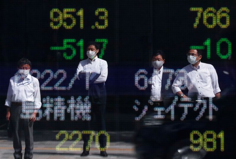 Dollar buoyant on tightening hopes, Asian stocks eye quarterly loss