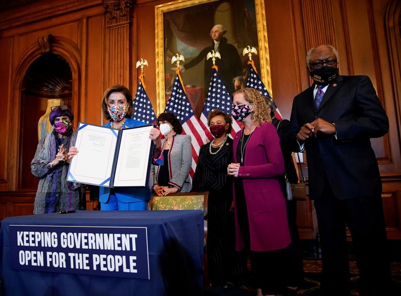 In Capitol visit, Biden tries to make peace with feuding Democrats