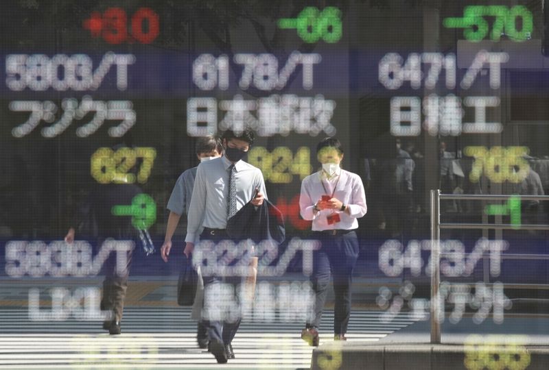 Asia shares up, rising yields lift dollar as oil surges