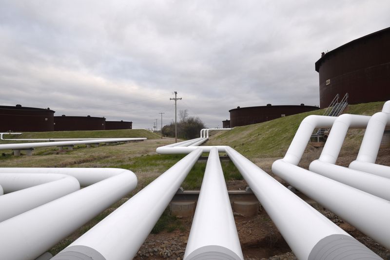 Crude jumps on global energy crunch; U.S. oil at 7-year high