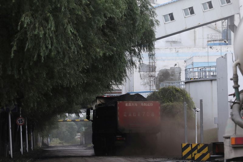 Cold keeps China coal prices high, power crunch stokes factory inflation