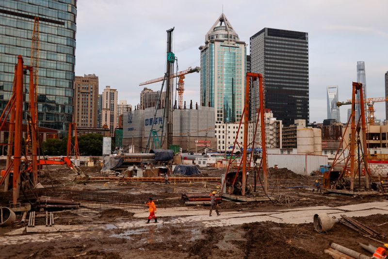 China's economy stumbles on power crunch, property woes
