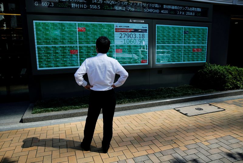 Chinese and HK shares fall as China Q3 GDP misses estimates