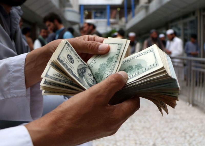 Dollar Up, Pound Up as BOE Signals Earlier-Than- Expected Interest Rate Hike