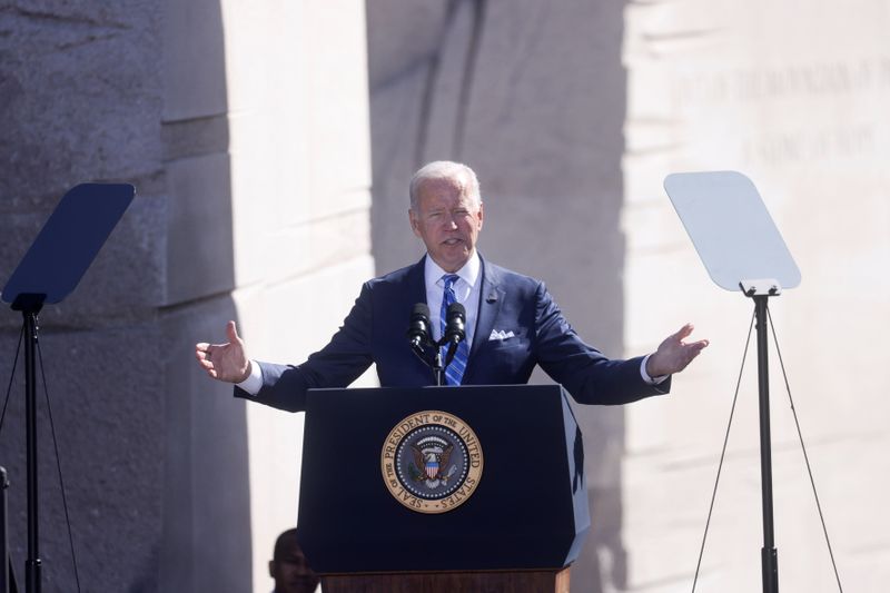 Biden backs down on corporate tax hikes, open to altering filibuster
