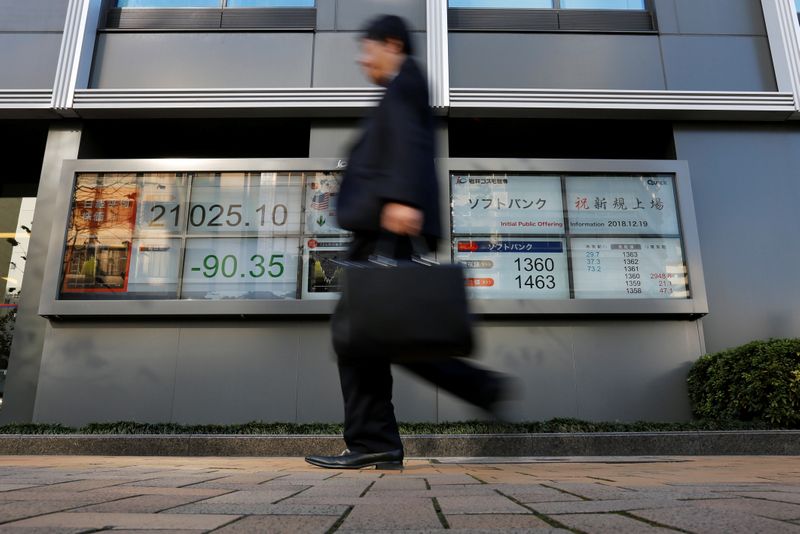 Stocks rally in Asia, China property sector worries dampen sentiment