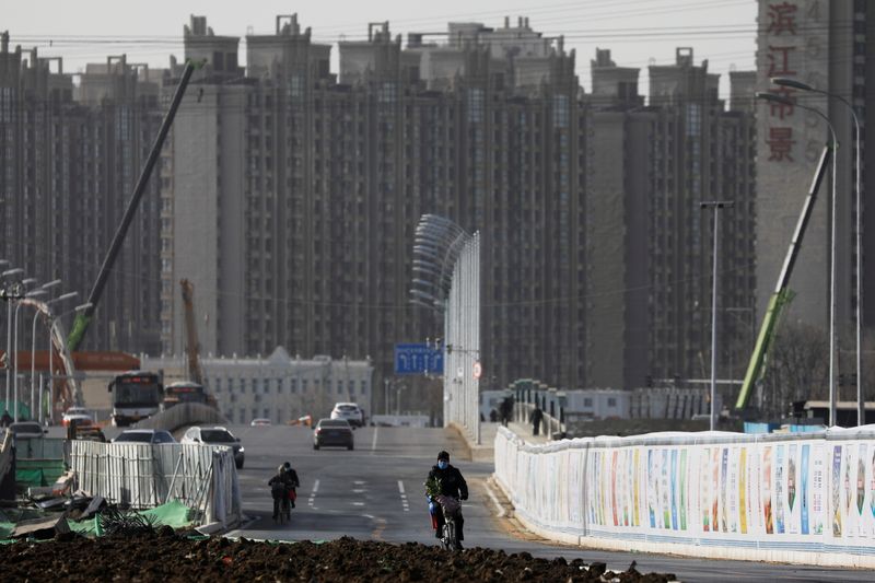 China property firms' shares, bonds take hit after Yango debt exchange