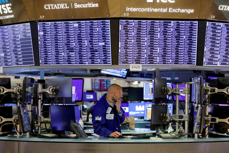 Wall St record run rolls on after Fed unveils anticipated bond-buying 'taper'