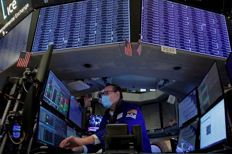 Asian stocks pull back, bond yields drop on reported shelling in Ukraine