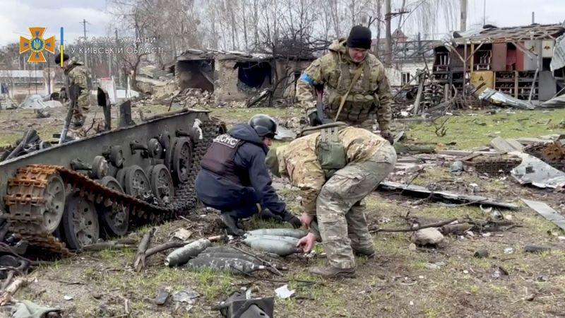 Russian forces pound key cities as West prepares new sanctions