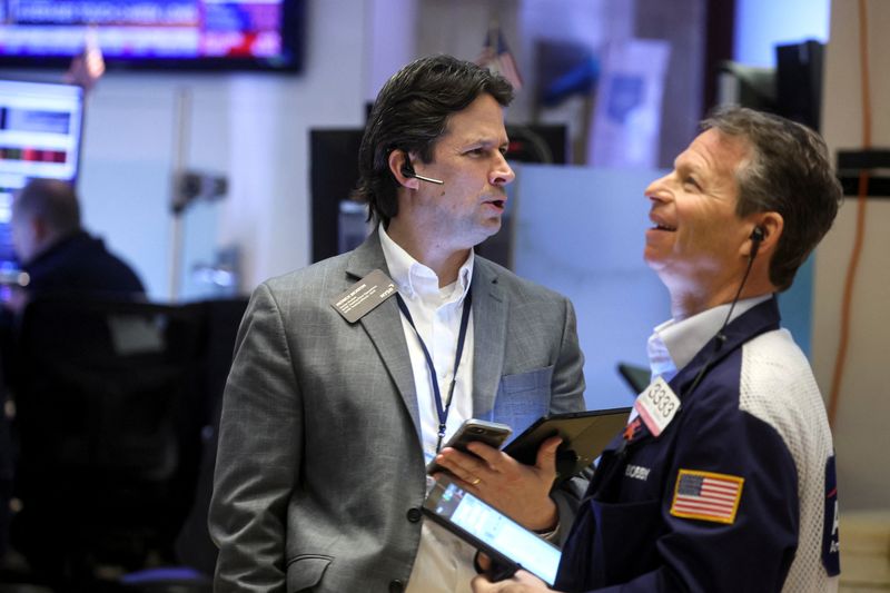 S&P 500 ends higher, lifted by Tesla