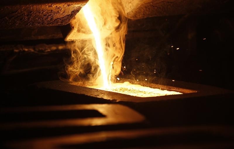 Gold Down, Near Two-Week Low Over Increasing Expectations of Hawkish Fed