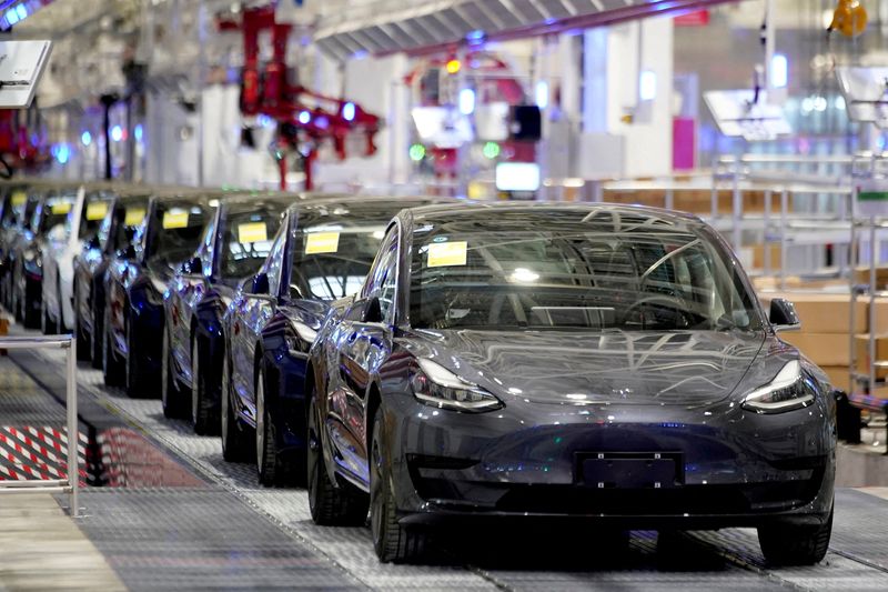 Exclusive: Tesla halts most production at Shanghai plant on Tuesday - memo