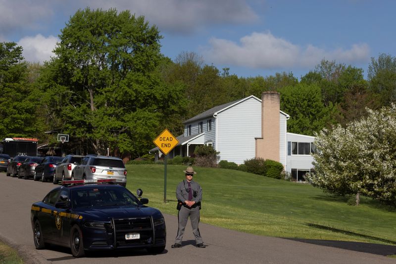 NY suspect in racist shooting was questioned after threat last year