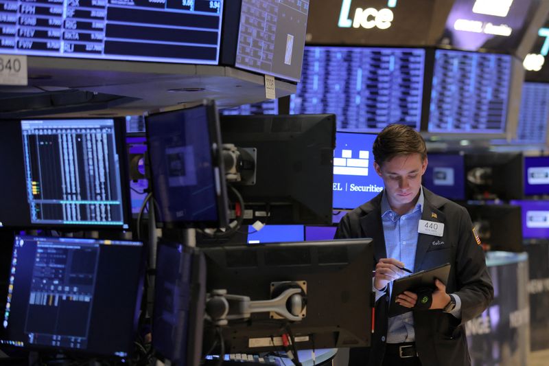 Wall Street jumps on retailer outlook hikes, ebbing Fed fears