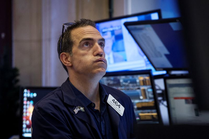 Wall Street jumps with tech, energy; Target news weighs on retailers