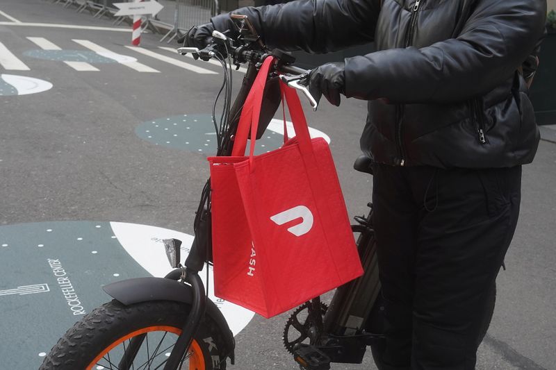 DoorDash, Uber, VMware Fall Premarket; Altria, Rocket Companies Rise
