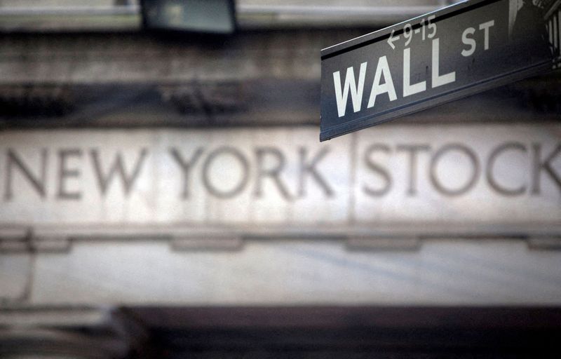Wall Street closes higher boosted by tech stocks gains on upbeat earnings