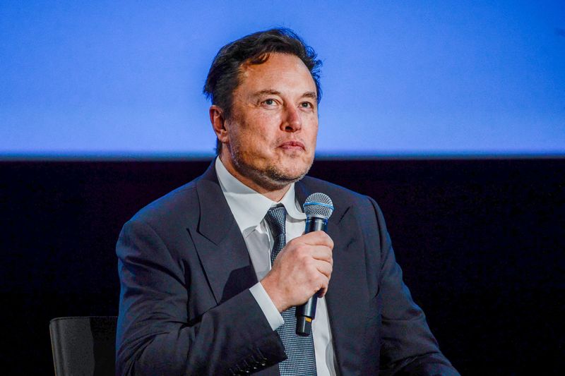 Tesla vows to halve EV production costs, Musk keeps affordable car plan under wraps