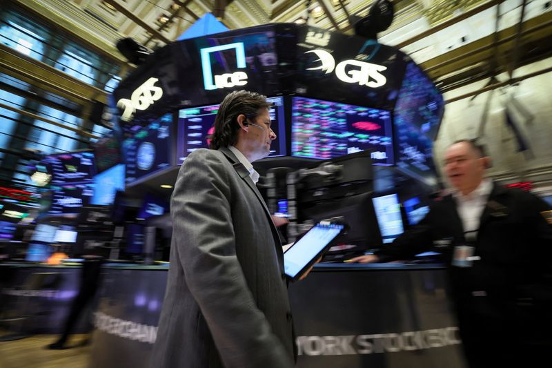 Wall St ends higher as Yellen vows actions to safeguard deposits