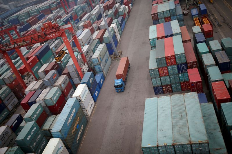 Asian company earnings cut on China, global slowdown worries